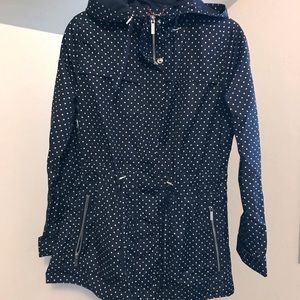 Navy polka dot rain coat